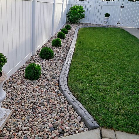 Yard Trim Landscaping, Backyard Fence Edging Ideas, Simple Outdoor Landscaping Ideas, Landscape Design Fence Line, Landscape Around Fence Line, Concrete Patio Edging Ideas, Backyard Border Ideas, Rocks Along Fence, Rock Along Fence Line