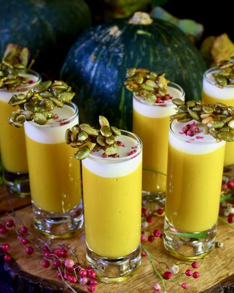 Kabocha Soup Shooters with candied pepitas, creme fraiche and pink peppercorns Savory Shooters Food, Shotcuterie Party, Pumpkin Cheesecake Shooters, Butternut Squash Soup Shooters, Shooter Glass Appetizers, Candied Pepitas, Kabocha Soup, Holistic Eating, Soup Shots