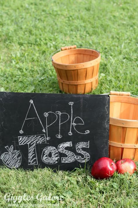 Apple Toss Game Fall Apple Festival Ideas, Apple Dunking Game, Apple Toss Game, Harvest Party Preschool, Fall Festival Table Decorations, Harvest Games Fall Festivals, Fall Yard Games, Apple Festival Ideas, Apple Games For Kids