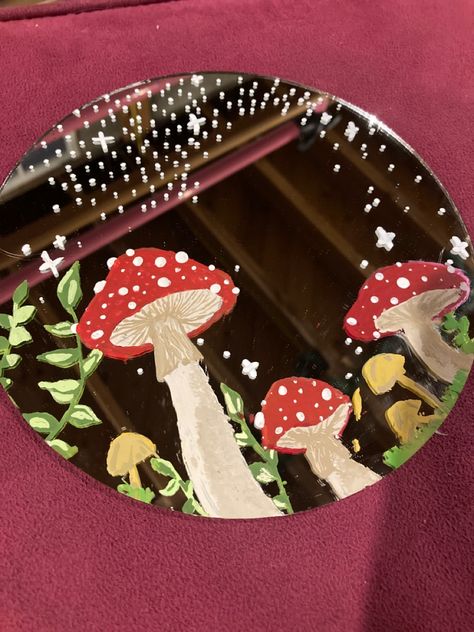 A mirror that has mushrooms on it✨ Mushroom Painting Mirror, Mushroom Painted Mirror, Mushroom Mirror Painting, Mirror Painting Mushrooms, Mushroom Record Painting, Drawing On A Mirror, Mushroom Mirror Diy, Draw On Mirror, Painted Mirror Aesthetic