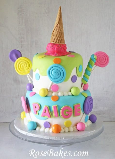 This cake has lots of lollipops and candy and an ice cream cone on top!  It's bright and colorful and precious for a little girl's fantasy Candyland party! Giant Cupcake Cakes, Candyland Cake, Candy Birthday Cakes, Fun Cakes, Ice Cream Birthday Party, Giant Cupcakes, Candy Cakes, Ice Cream Candy, Ice Cream Birthday