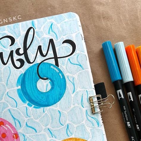 SHEdesignsKC on Instagram: "July seems like a pretty perfect month for a pool party! Loving these fun colors for the month! Save 10% on your Archer & Olive purchases with code SHEDESIGNSKC10 Supplies used: Journal: @archerandolive Pens: @tombowusa - Dual brush pens @micronart - Fine liners . . #bulletjournaljunkies #bulletjournalcoverpage #bulletjournalspread #bulletjournal #coverpage #julybujo #bulletjournalcommunity #bujo #bujocoverpagelayout #bujocoverpagespread #bujocover #bujogram #bujo Bullet Journal Savings Tracker, August Bujo, Bullet Journal Savings, Bujo Cover, Notes Cover, Bullet Journel, Organization Bullet Journal, Bullet Journal Cover Page, Bullet Journal Mood Tracker Ideas