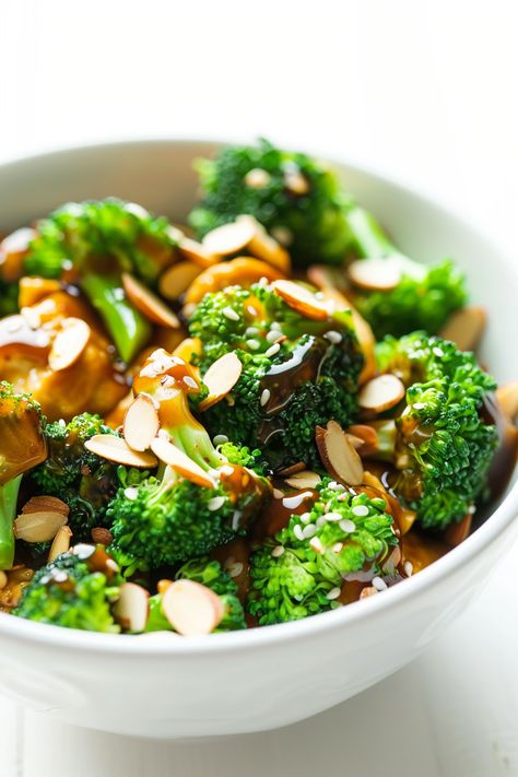 Easy Keto Broccoli and Almond Stir-Fry Recipe: A Healthy Low Carb Meal Option #ketodiet #ketorecipes #lowcarb Keto Broccolini Recipes, Low Carb Broccoli Recipes Side Dish, Low Calorie Broccoli Recipes, Keto Chicken Broccoli Stir Fry, Almond Broccoli, Keto Stir Fry, Keto Broccoli, Air Fryer Chicken Thighs, Chicken Thigh Recipes Oven