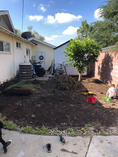 I’ve always wanted a beautiful backyard garden space. I just think they are a beautiful way to use a backyard space. It’s so nice to have home grown food and I just think they’re beautiful.I also thought it was important to create this place for the whole family, so we included a dirt pit for the kids, in addition to all the learning they’ll be getting in the garden as well!We chose a spot in our backyard where the plants would get at least 6 hours a day of sunlight. It's on the West… Front Yard Hang Out Area, Dirt Backyard Makeover On A Budget, Dirt Yard Makeover On A Budget, Dirt Backyard Ideas, Dirt Backyard Makeover Diy, Outside Inspiration, Grilling Station, Diy Outdoor Space, Outdoor Makeover