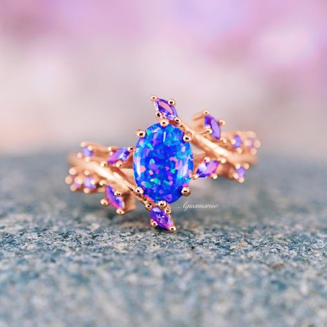 Starry Night Van Gogh Fire Opal & Cornflower Sapphire Engagement Ring ►Embrace the beauty of the cosmos with our Starry Night Van Gogh Fire Opal & Cornflower Sapphire Engagement Ring. Inspired by Van Gogh's iconic masterpiece, this exquisite ring captures the swirling brilliance of the night sky with a captivating Fire Opal at its center. The vibrant opal, known for its fiery play of color, is complemented by a delicate Cornflower Sapphire--a symbol of loyalty and love--that mirrors the serene b Cornflower Sapphire, Starlit Night, Mens Wedding Bands Black, Black Wedding Band, Starry Night Van Gogh, Sapphire Engagement Ring, Silver Shop, Sapphire Engagement, Engagement Rings Sapphire