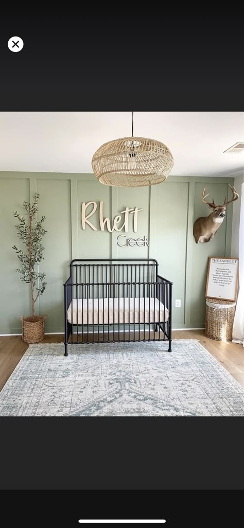 Nursery Green Accent Wall Black Crib, Black Brown Green Nursery, Sage Green Nursery Black Crib, Black And Oak Nursery, Rustic Modern Nursery, Southern Baby Boy Nursery, Dark Crib Nursery, Black Furniture Nursery, Nursery Black Crib