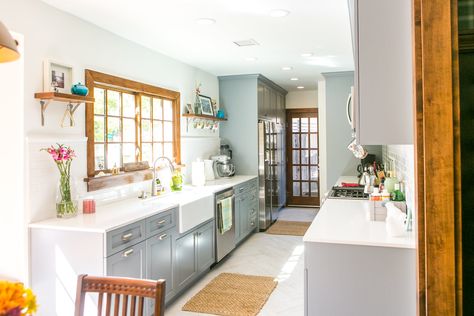 Before and After: A Dark, Dated Galley Kitchen Gets a Modern Makeover Galley Kitchen Design, Galley Kitchen Remodel, Kitchen Ornaments, Galley Kitchens, Diy Kitchen Remodel, Living Kitchen, Galley Kitchen, White Cabinetry, Living Room Remodel