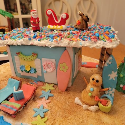 Beachy Gingerbread House, Movie Themed Gingerbread House Ideas, Gingerbread Beach House Ideas, Beach Theme Gingerbread House, Beach House Gingerbread House, Beach Gingerbread House Ideas, Gingerbread House Beach, Gingerbread Cardboard House, Beach Gingerbread House