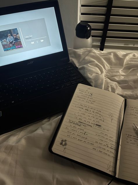 book laid out on a bed with a computer at the side Writing At Night Aesthetic, Write A Song Aesthetic, Lyric Writing Aesthetic, Late Night Writing Aesthetic, Writing Lyrics Aesthetic, Writing Music Aesthetic, Writing Songs Aesthetic, Song Writing Aesthetic, Songwriting Aesthetic