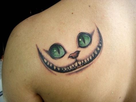 50 Incredible Tattoos Inspired By Books Cat Eye Tattoos, Disney Inspired Tattoos, Cheshire Cat Tattoo, Kitty Tattoos, Alice And Wonderland Tattoos, Petit Tattoo, Literary Tattoos, Wonderland Tattoo, Sick Tattoo