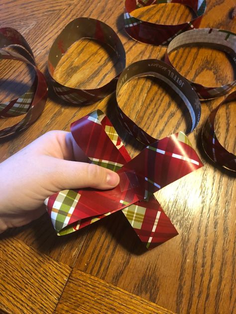 Make Bows Out Of Wrapping Paper, Making Bows Out Of Wrapping Paper, Bows For Presents How To Make, Making A Bow Out Of Wrapping Paper, Wrapping Paper Bow Easy, How To Make A Bow From Wrapping Paper, Wrapping Paper Bows Diy, Bows From Wrapping Paper, Diy Paper Bows For Presents