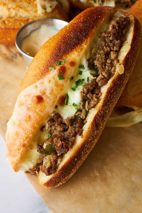 This Philly Cheesesteak Sandwich is made with ground beef, it's simple and easy, this works great as sliders too! #sandwich fooddolls.com Sandwiches With Ground Beef, Ground Beef Grinder Sandwich, Baked Hoagie Sandwiches, Shaved Beef Philly Cheese Steak, Ground Beef Hoagie Recipes, Ground Beef Filly Cheese Steak, Ground Beef Sandwich Recipes, Ground Beef Hoagie, Philly Cheese Steak Sandwich Recipe Using Deli Roast Beef