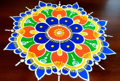 Sankranti Muggulu 2024, Check the best Muggulu Designs, Chukkala Muggulu and Rangoli Designs for Makar Sankranti here Rangoli For Sankranti, Sankranti Muggulu, Indian Rangoli Designs, Sankranthi Muggulu, New Year Rangoli, Hindu Symbols, Chukkala Muggulu, Muggulu Designs, Cracked Wallpaper