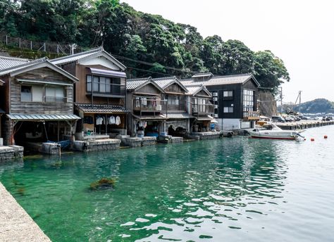 One of the coolest experiences we had on our latest trip to Japan was visiting the tiny coastal town of Ine and seeing all of the Funaya (boat houses) that are clad in traditional yakisugi. Crystal clear water, amazing fishing and a boat garage in every home - the people of Ine have life figured out! #yakisugi #shousugiban #japan Japanese Seaside Town, Japanese Coastal Town, Charred Wood Siding, Boat Garage, Japan Beach, Fishing Town, Japanese Town, Wabi Sabi Aesthetic, Beach Village