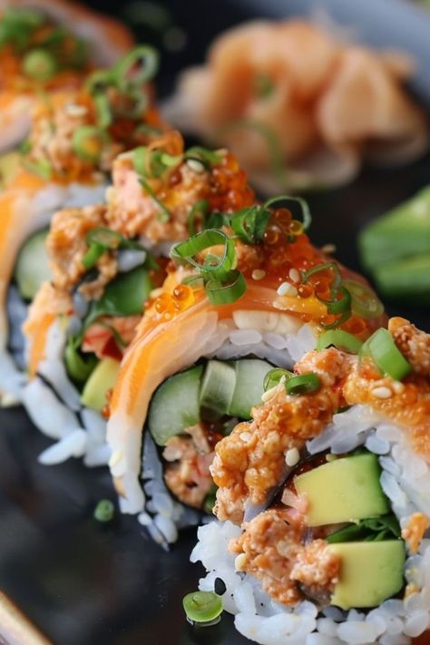 Spicy Tuna Rolls are a delicious and nutritious choice for any mealtime! 🍣🌶️ Made with fresh tuna, zesty sriracha, and perfectly seasoned rice, these rolls are a delightful blend of bold flavors and satisfying textures. Quick to prepare and bursting with spicy goodness, Spicy Tuna Rolls are perfect for a refreshing lunch or a special dinner. Indulge in this vibrant twist on a classic favorite today! 😋🌿 #SpicyTunaRolls #SushiLovers #HealthyEating #BoldFlavors Type Of Sushi, Sushi Board, Tuna Roll, Ham Pasta, Spicy Tuna Roll, Sushi Lunch, Fresh Tuna, Delicious Seafood Recipes, Creamy Garlic Chicken