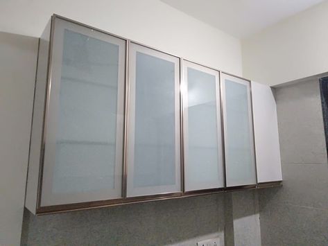 Modular kitchen overhead crockery unit with frost glass in aluminum frame. Frosted Glass Kitchen Cabinets, Kitchen Glass Door, Kitchen Crockery, Crockery Cabinet Design, Crockery Cabinet, Crockery Unit Design, Crockery Design, Crockery Unit, Interior Design Videos