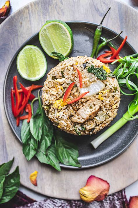 Thai green curry fried rice is a delicious and easy recipe that marries two recipes into one robust dish using fried rice and green curry paste. You don’t want to miss out on the flavor explosion of this lesser-known Thai recipe #Thaigreencurryfriedrice #thaigreencurryfriedricerecipe #greencurryfriedrice #thaicurryfriedricerecipes #thaifriedrice Hot Thai Kitchen, Curry Fried Rice, Asian Food Photography, Thai Fried Rice, Green Curry Chicken, Thai Kitchen, Thai Green Curry, Thai Recipe, Green Curry Paste