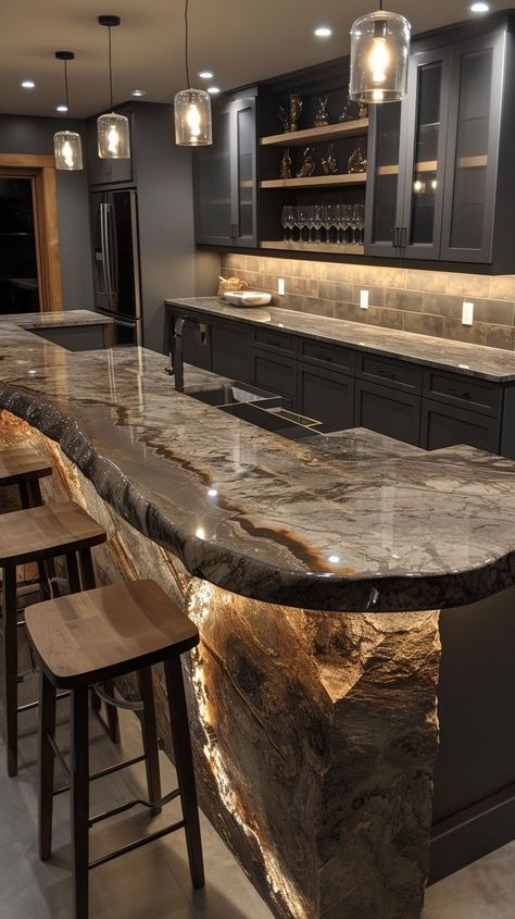 Luxurious modern kitchen with dark cabinets, marble countertop, stylish pendant lights, and high-end appliances Dark Marble Countertops, Extended Kitchen, Kitchen With Dark Cabinets, Dark Marble, Marble Countertop, Dark Cabinets, Casual Dining, Marble Countertops, Mini Bar