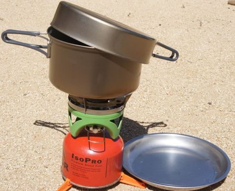 Drinking Salt Water Method 1: Boil – Evaporate – Collect: Place the lid on the pot so that it is slightly tilted to one side and hanging off the edge of the pot. The condensed water will travel down to the lowest point. Place a receptacle right under the lowest point of the lid Best Camping Stove, Camping Pot, Backpacking Stove, Camp Food, Cooking Kit, Portable Stove, Alcohol Stove, Camping Cookware, Cooking Stove