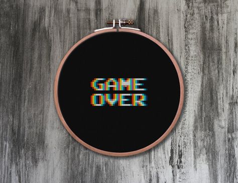 Game Over 4-in-1 Cross Stitch Pattern … This Visual Effect Is Easier Than You Think! | KnitHacker Stitch Games, Funny Cross Stitch Patterns, Subversive Cross Stitch, Cross Stitch Funny, Embroidery On Clothes, Crochet Cross, Dmc Floss, Fuse Beads, Crafty Diy