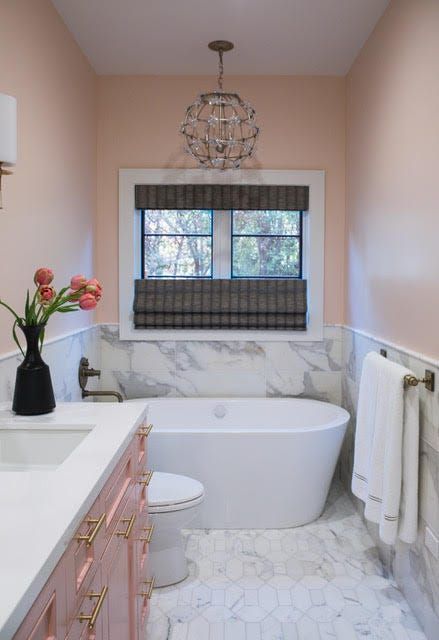 The 13 Best Coral Paint Colors to Brighten Your Walls Coral Bathroom Vanity, Coral And White Bathroom, Peach Colored Bathrooms, Coral Entryway, Pale Salmon Paint Color, Benjamin Moore Sunlit Coral, Coral Paint Color, Peach Colour Bathroom, Mellow Coral Paint