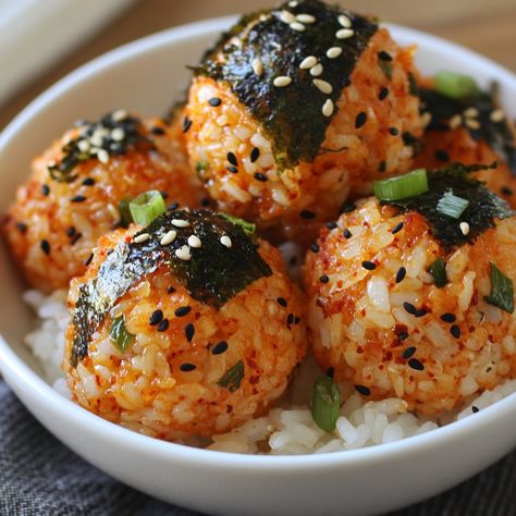 🍙 "Snack on these tasty Korean Kimchi Rice Balls—a fun and flavorful treat!" 🍙✨ #KimchiRiceBalls #KoreanSnacks Korean Kimchi Rice Balls Ingredients: Cooked rice (2 cups) Kimchi (½ cup, chopped) Soy sauce (1 tbsp) Sesame oil (1 tsp) Nori sheets (cut into strips) Sesame seeds (1 tsp) Green onions (for garnish) Instructions: In a bowl, mix rice, chopped kimchi, soy sauce, and sesame oil. Form the mixture into small balls. Wrap each ball with a strip of nori. Garnish with sesame seeds and gre... Kimchi Rice Balls, Nori Sheets, Sesame Balls, Kimchi Rice, Korean Kimchi, Korean Rice, Instagram Recipes, Korean Snacks, Cooked Rice