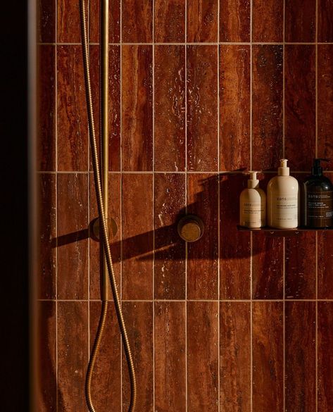 Relax and unwind at @sos.senseofself and check out the wonderful red travertine walled showers. 📸by: @annikakafcaloudis Rust Shower Tile, Rust Bathroom Tiles, Bathhouse Interior Design, Red Travertine Bathroom, Rust Tile Bathroom, Earthy Shower Tile, Dark Orange Bathroom, Orange Bathroom Tiles, Brown Beige Bathroom