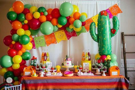 You don't want to miss this fun Fiesta, Mexican themed 1st Birthday Party!! Love the decor! See more party ideas and share yours at CatchMyParty.com #catchmyparty #partyideas #fiestabirthdayparty #fiestadecor #fiestabackdrop #balloongarland #cactus #girl Fiesta Mexicana Ideas, Mexican Fiesta Birthday Party, Mexican Theme Party Decorations, Mexican Baby Shower, Mexican Birthday Parties, Deco Ballon, Mexican Party Decorations, Themed 1st Birthday, Mexican Fiesta Party