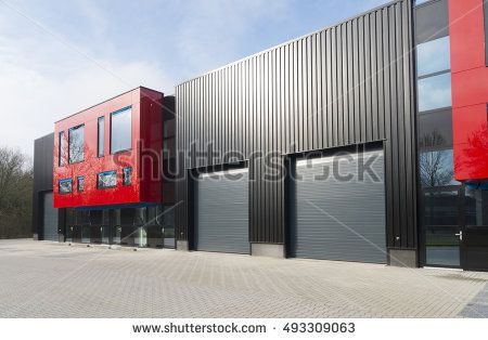 DENEKAMP, NETHERLANDS - FEBRUARY 13, 2016: Modern exterior of a newly build industrial building with red office units Industrial Building Facade, Warehouse Exterior, Factory Architecture, Aluminium Cladding, Warehouse Design, Cladding Panels, Exterior Modern, Industrial Design Furniture, Industrial Warehouse