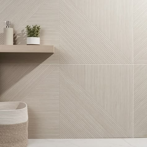 A good sense of direction The Enso Ribbed Ash 24x48 Matte Porcelain Tile is well-suited to statement walls and surprising installationsA cool ash-gray hue complements its subtle relief pattern, while multiple angles give the collection a decidedly modern vibeEnso’s large format requires less grout, so the wood look is nearly seamless—whether installed in a kitchen backsplash or outdoor showerClean, articulated design Modern geometry meets midcentury inspiration in the Enso collectionThis wood-lo Modern Tile For Bathroom, Full Tile Bathroom Wall, Organic Modern Shower Tile, Minimal Kitchen Backsplash, Scandinavian Tile Floor, Textured Porcelain Tile, Ribbon Tile Backsplash, Large Floor Tiles Bathroom, White Tile Master Bath