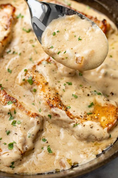 This 25-minute cream of mushroom soup pork chops recipe has tender and juicy pork chops in a rich and creamy sauce! Condensed soup is the ultimate shortcut. Mushroom Soup Pork Chops Instant Pot, The Best Pork Chops Ever Tipsy Housewife, Pork Chop Recipes With Cream Of Chicken, Pork Chop With Mushroom Soup, Pork Chop And Mushroom Gravy, Instant Pot Smothered Pork Chops With Cream Of Mushroom Soup, Smothered Pork Chop Casserole, Gravy Smothered Pork Chops, How To Cook Butterfly Pork Chops