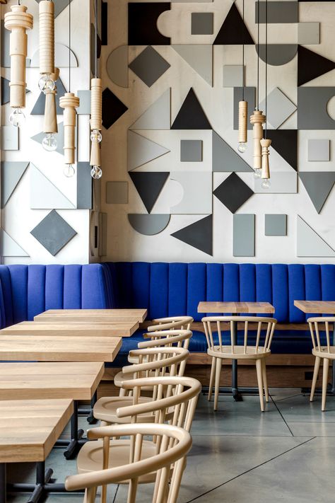 Banquette Restaurant, African Furniture, Rich Decor, Church Interior Design, Colorful Geometric Pattern, Concrete Stained Floors, Communal Table, Cafe Interior Design, Green Tile