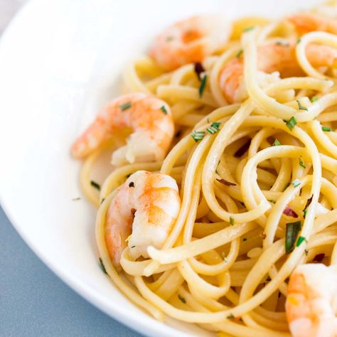 This Rosemary Shrimp Pasta is effortlessly elegant yet quick and easy. Perfect for a mid-week dinner with friends or Saturday date night. The shrimp are stirred through pasta, dressed with a simple garlic and rosemary sauce. And everything comes together in the time it takes to cook pasta! Just six ingredients go into this recipe, but don't be fooled. The flavors in this dish are simple, but they work so well together. Garlic, shrimp, fragrant rosemary, and lemons work so well with the pasta. Rosemary Shrimp, Rosemary Sauce, Tarragon Recipes, Garlicky Shrimp, Cooks Country Recipes, Creamy Pasta Dishes, Salmon Pasta, America's Test Kitchen Recipes, Lemon Pasta