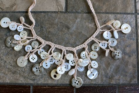 I finally decided to update the button necklace pattern, it was my first written pattern and I feel like my writing style has chang... Crochet Projects With Buttons, Crochet Around A Button, Crochet A Button, Button Necklace Diy How To Make, Crochet Necklace With Buttons, Crochet Button, Crochet Necklace Pattern, Crochet Jewlery, Writing Style