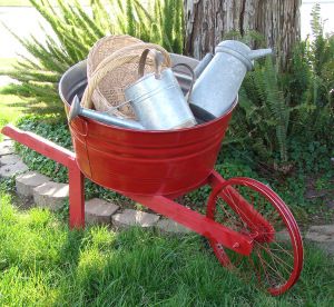 WHEEL BARROW Repurposed Tire, Wheelbarrow Planter, Feature Story, Old Bucket, Galvanized Tub, Garden Junk, Red Wagon, Craft Lovers, Lawn Decor