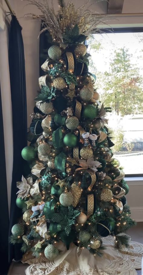 Gold Black And Green Christmas Tree, Green And Wood Christmas Tree, Flocked Tree Green Ornaments, Emerald Christmas Tree Decorations, Green Gold Ivory Christmas Tree, Emerald Gold Christmas Tree, Christmas Tree Gold And Green, Green Black And Gold Christmas Tree, Christmas Tree With Green Decorations