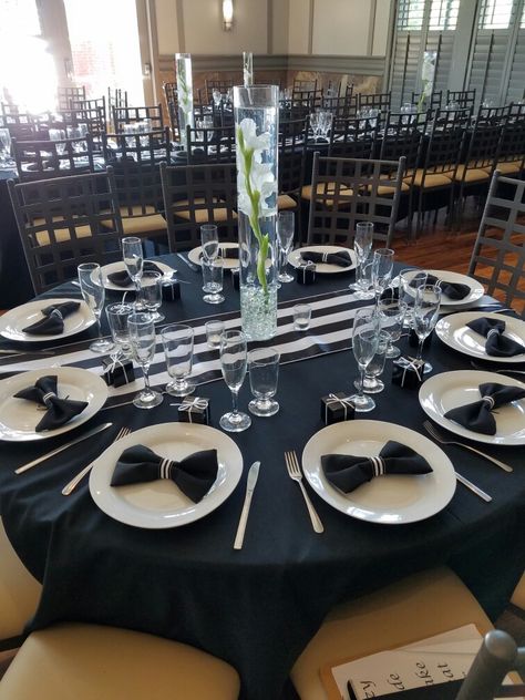 Wedding reception table setting Black Tie Table Centerpieces, Table Setting For Mans Birthday, Barber Shop Party Ideas Decor, Bowtie Party Decorations, 007 Table Decorations, Man Decoration Party, Tuxedo Party Ideas, Black And White 50th Birthday Party Decoration, Table Decorations Birthday Men