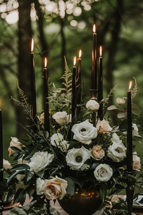 Moody wedding centerpieces add depth and drama with dark hues and lush textures. See more ideas here. Dark Green Flower Arrangements, Black Woodsy Wedding, Dark Wedding Vibes, Black White And Dark Green Wedding, Gothic Nature Wedding, Dark Green And Black Wedding Theme, Dark Green Wedding Flowers, Moody Wedding Arch, Dark Moody Romance Wedding