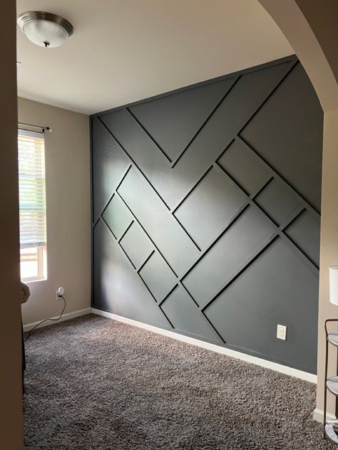 Custom feature wall in Behr’s “Dark Ash” matte finish. Trim Wall Design, Unique Wall Design, Cheap Basement Remodel, Yellow Bed, Trim Wall, Diy Bed Headboard, Luxury Apartments Interior, Grey Accent Wall, Accent Wall Designs