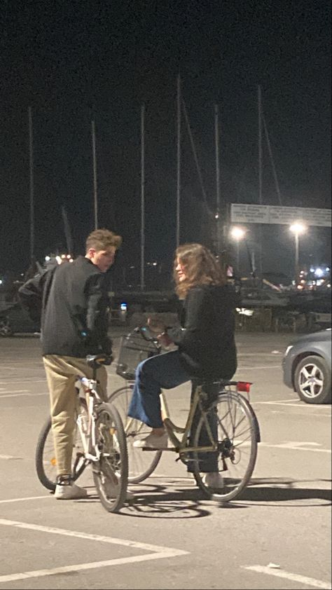 #aesthetic #art #bike #parking #night #photography Cycling Date Aesthetic, Couple Riding Bike Aesthetic, Bike Date Aesthetic, Cycling Couple Aesthetic, Along For The Ride Aesthetic, Boy Riding Bike Aesthetic, Couple Bicycle Aesthetic, Bike Couple Aesthetic, Riding Bicycle Aesthetic