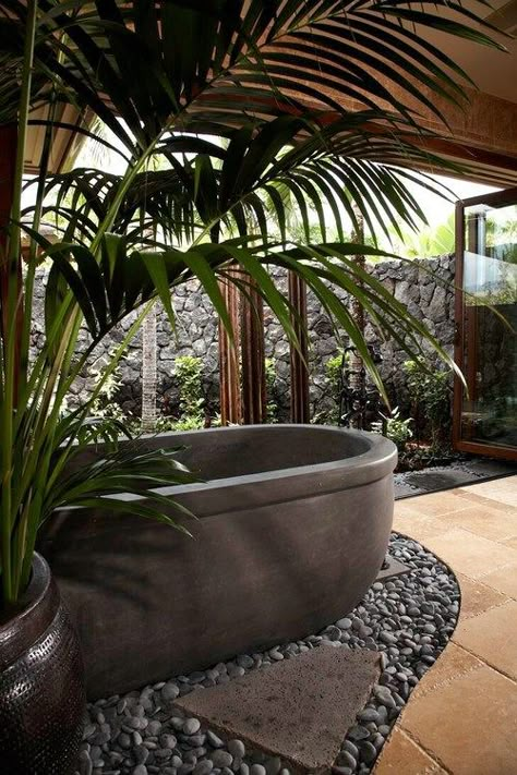 This bath! Love the use of lava rock wall. Hawaiian Home full of delicious style and views | Trying to Balance the Madness Outdoor Bathroom Design Ideas, Tropical Bathroom Decor, Concrete Bathtub, Outdoor Bathroom Design, Hawaiian Homes, Tropical Bathroom, Outdoor Baths, Hawaiian Decor, Outdoor Bath