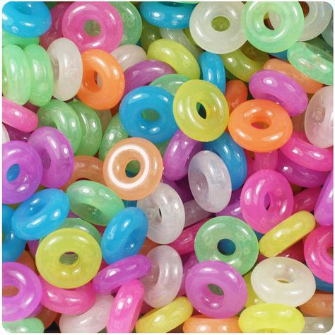 These multi colors semi glow donut shaped plastic craft rings measure 14mm diameter, 4mm thick and have a large 4mm center hole. Our plastic craft products are made in the USA with high-quality plastic and come in packs of approx 100 rings. 14mm Ring (847) Glow Mix (285) Random mix of colors in each pack Colored rings have a diminished glow effect Non-toxic Polystyrene Plastic Multi Color Aesthetic, Plastic Bead Crafts, Rings Craft, Honey Combs, Colored Rings, American Baby Doll, 100 Rings, Plastic Craft, Plastic Rings