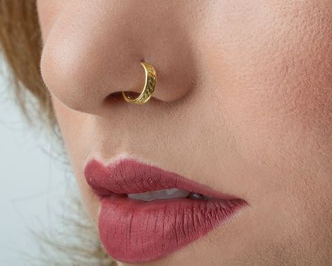 nose pin ,nose stud, nose ring designs, nose jewellery , jewellery #nose #pin #ring #stud #designs #nosepin #nosestuds #Nosepin #Nosering #nosejewellery #Goldnosestuds #Jewelrydesigns #nosepinandringdesign #silvergoldanddiamondnosering #nosestud #jewellery #24kgoldnosepinandring #gold #diamond #silver #2022 #fashiongala Nose Ring Designs, Nostril Jewelry, Rose Gold Nose Ring, Unique Nose Rings, Nose Ring Jewelry, Gold Nose Hoop, Gold Nose Ring, Gold Nose Stud, Sweet Lips