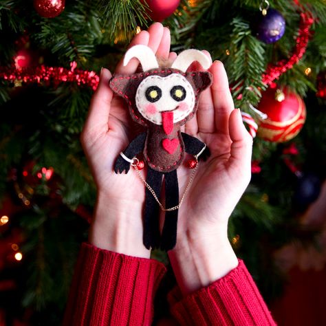 Decorate your tree with a handmade Krampus ornament in celebration of the famous Christmas beast from Austria! The free printable pattern is included. #krampus #christmas #christmascrafts #christmasornaments Diy Krampus Ornament, Diy Krampus, Krampus Ornaments Diy, Diy Spooky Ornaments, Krampus Christmas Tree, Krampus Christmas, Krampus Decorations, Spooky Christmas, Yule Crafts