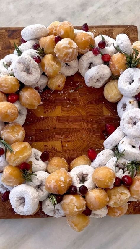 2.5M views · 2.8K shares | How cute is this donut wreath for Christmas morning? It's also a beautiful centerpiece! 3 dozen donut holes from my local donut shop 2 bags of mini powdered donuts Cranberries and rosemary! Share with a friend 🎄 | Mackenzie Biehl | Forrest Frank · Deck The Halls Donut Wreath, Holiday Donuts, Dozen Donuts, Wreath For Christmas, Christmas Donuts, Powdered Donuts, Christmas Morning Breakfast, Holiday Eating, Donut Holes