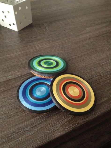 Coasters! Made these coasters with curling ribbon, tape and stiffening spray! Quilling Coasters, Coasters Diy, Coaster Ideas, Rolled Paper Art, 3d Quilling, Quilling Ideas, Curling Ribbon, Diy Coasters, Clay Jewelry Diy