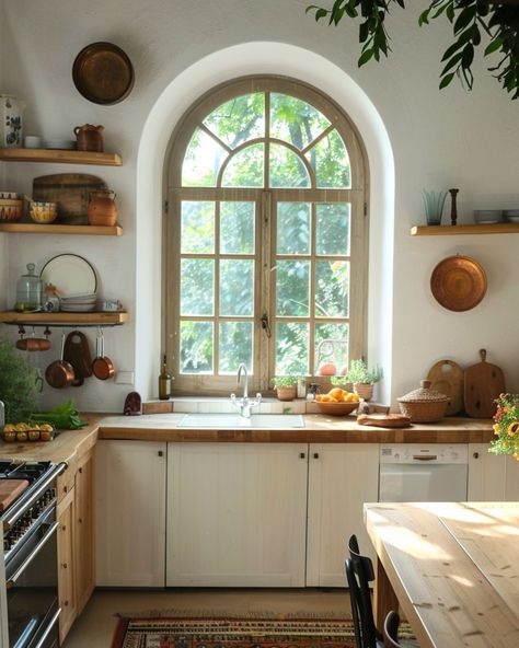 Which kitchen would you like to have breakfast in? I think my favourite has to be no. 2. The simplicity of the design makes the arched window stand out and the oak countertops tie in nicely with the central wooden table. I love the aesthetic of a Persian rug in the kitchen, but the practicality means it probably wouldn’t work. Especially with my kids favourite hobby of having food fights with themselves 😂😂 AI Assisted Design - @melaniejadedesign #curvedwindows #archedwindows #archedwindow ... Window Over Oven, Arch Window In Kitchen, Kitchen With Arched Windows, Arched Windows Kitchen, Arch Window Kitchen, Arch Kitchen Window, Arched Kitchen Window, Arches Window, Kenya Beach