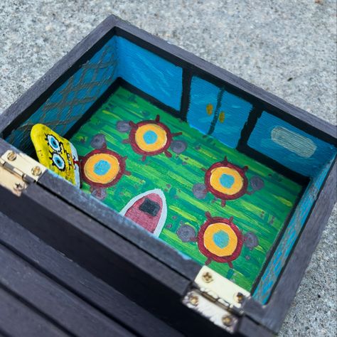 Painted this treasure chest box to look like the Krusty Krab . . . . . . #paint #paints #painting #paintings #art #arts #artsy #artstudio #artist #artistic #acrylic #acrylicpainting #acrylicart #acrylicpaint #box #boxes #paintedbox #spongebob #sponge #krustykrab #bikinibottom #spongebobpainting Treasure Box Painting Ideas, Paint Box Ideas, Stash Box Painting Ideas, Box Painting Ideas, The Krusty Krab, Box Painting, Krusty Krab, Spongebob Painting, Painted Box