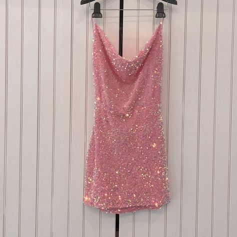 This Dress Is A Cute Mini Dress Perfect For A Homecoming, New Years, Sweet Sixteen Or Any Event. It’s Sequined And Is A Beautiful Strawberry Pink. There Is A Light Weight Lining Built In And The Neck Is Cowl. The Back Is Really Beautiful And Is Open With A Few Straps That You Can Tie To Your Fit. This Dress Is Brand New And Has Never Been Worn. It Is A Size Medium But It Is Adjustable! Hoco Dresses Sparkle, Light Pink Bodycon Dress, Pink Sweet Sixteen, Homecoming Inspo, Cute Hoco Dresses, Lucy In The Sky Dress, Rose Body, Pink Sequin Dress, Cute Mini Dress