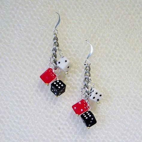 These are casino ready dice beaded dangle earrings.  Dice beads are red, white and black acrylic and are wire wrapped and linked to silver chain. Fun look for "Vegas" night party or a great gift for a  Vegas bound bachelorette party favor or gift. Length of the earrings is 1 1/4" (3 cm) If you would prefer these in antique brass, gunmetal silver or gold instead of the silver pictured, just send me a message for a custom order. All of my jewelry items come in a box with a ribbon tie and a tag for Dice Earrings Diy, Casino Earrings, Vegas Night Party, Casino Jewelry, Dangle Bead Earrings, Dice Jewelry, Dice Earrings, Vegas Bachelorette Party, Jewels Diy